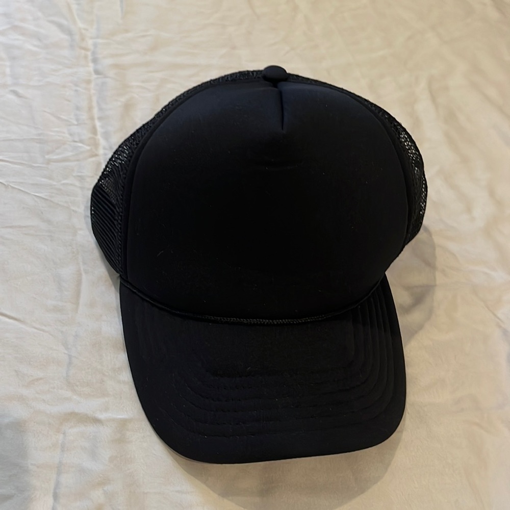 Plain black 100% polyester trucker hat